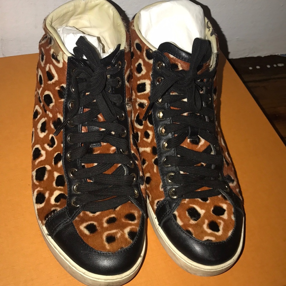 Gucci, pony hair leopard sneakers.